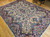 Vintage Persian Kerman Lavar room size  rug in an all-over floral pattern from the early 1900s.  The beautiful Kerman has a floral pattern with flower bouquets in various colors throughout the field in ivory,  red, pink, blue, yellow, and green.  The rug has a wide border with a similar design and color pallet. The profusion of the colors gives one the sensation of walking into a beautiful garden on a nice summer day.
Dimensions:  9' x 12'
Date of Manufacture:  1st Quarter of the 1900s
Place of Origin:  Persia
Material:  Wool pile on a cotton foundation
Condition:  Wear consistent with age and use
SKU: 1018
