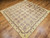 Vintage American Block Flowers Quilt | Handwoven | In-Room View 4