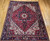 Vintage Persian Heriz Rug 8x10 | Navy Medallion Red | Full View on Floor