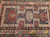 Early 1900s Caucasian Kuba Area Rug in French Blue from the Baku area of the southeast Caucasus.  The Kuba rug is in a triple medallion design in red and cream, and yellow accent colors set in an abrash French blue color field.  The border is in baby blue and dark brown colors with geometric designs.  A masterpiece of village weaving with brilliant design and colors.