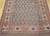 Mid 19th century Persian Afshar tribal gallery rug with allover paisley boteh pattern on navy blue field and ivory geometric border, The Persian Knot Gallery, SKU 1002