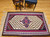 Mid-20th Century Vintage Persian Senneh (Bidjar) Kilim area rug with a central geometric medallion in dark blue, red, cream, yellow on an ivory field with small flower motifs. Ivory border with blue and red accent designs, The Persian Knot Gallery, SKU 14