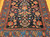 Vintage Persian Malayer rug with allover geometric pattern in navy, French blue, green, pink, and red – early 1900s hand-knotted rug with natural abrash and floral border.