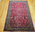 Vintage Persian Kerman Lavar in "Tree of Life" pattern with floral design set in an ivory color field from the first half of the 20th century.  There are several beautiful designs that are incorporated in this rug including a row of cypress trees on the l