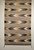 Vintage Navajo rug in a banded chevron and stripe pattern in natural earth tones including gray, ivory, black, and caramel, The Persian Knot, SKU 1567