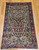 Antique Persian Kerman Lavar Rug | Floral Field | Full View on Floor