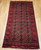 Antique Turkmen Rug | Gul Pattern, Deep Red | Full View on Floor