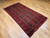 Antique Turkmen Rug | Gul Pattern, Deep Red | In-Room View 4