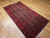 Antique Turkmen Rug | Gul Pattern, Deep Red | In-Room View 8