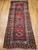 Antique Caucasian Kazak Rug 2x6 | Bold Geometric | Full View on Floor