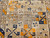Antique 19th-century Caucasian Kazak bagface with geometric squares in blue, brown, and red. Small tribal rug for wall display or textile collection.