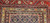 Late 19th Century Antique Kurdish gallery-size rug. Hand-woven. Paisley pattern. Blue background. Predominantly rust-colored border. Ideal for a hallway or as a wide runner.
