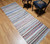 Vintage mid-century American rag runner with striped pattern in blue, green, ivory, and red, handwoven from recycled fabric., The Persian Knot Gallery, SKU 1599