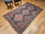 Antique Persian Qashqai Tribal Rug | Geometric | In-Room View 9
