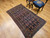 Early 20th Century Vintage Persian Senneh area rug. Hand-knotted. All-over "Herati" pattern on abrash navy blue background. Extremely fine weave, high knot density. French blue border with geometric pattern. Accent colors: red, yellow, ivory.
