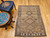 Vintage Kurdish Bidjar area rug. Hand-woven. Geometric diamond design with scattered small tree forms. Abrash natural camelhair wool. Colors: camelhair, with accents in other natural colors. A gem of tribal weaving from Western Persia.