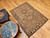 Vintage Kurdish Bidjar area rug. Hand-woven. Geometric diamond design with scattered small tree forms. Abrash natural camelhair wool. Colors: camelhair, with accents in other natural colors. A gem of tribal weaving from Western Persia.