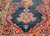 Antique Persian Farahan gallery rug with terracotta medallions on navy blue field and geometric border, late 19th century handwoven rug. The Persian Knot Gallery, SKU 1005