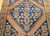 Antique Persian Bidjar gallery rug with geometric medallion design in terracotta red and navy blue field, handwoven Kurdish Hashtrang rug from the 1800s, The Persian Knot Gallery, SKU 1006