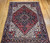 Vintage Persian Heriz Rug 8x11 | Red French Blue Medallion | Full View on Floor