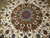 Rare square Tabriz rug featuring a cream field, chocolate and dark red borders, silk highlights, and a central medallion—handwoven in one of Tabriz’s finest workshops.