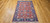 Vintage Turkish Mahal Sultanabad rug with brick-red field, navy border, and bold geometric allover design