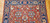 Vintage Turkish Mahal Sultanabad rug with brick-red field, navy border, and bold geometric allover design