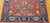 Vintage Turkish Mahal Sultanabad rug with brick-red field, navy border, and bold geometric allover design