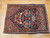 Early 20th century Persian Isfahan pictorial vase rug with navy field and floral bouquets, The Persian Knot, SKU 1166