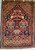 Early 20th century Persian Isfahan pictorial vase rug with navy field and floral bouquets, The Persian Knot, SKU 1166