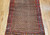 Antique Persian Kurdish Bidjar camelhair gallery rug with allover paisley boteh pattern in red blue and brown on natural camel background, The Persian Knot Gallery, SKU 1533