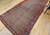 Antique Persian Kurdish Bidjar camelhair gallery rug with allover paisley boteh pattern in red blue and brown on natural camel background, The Persian Knot Gallery, SKU 1533