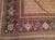 Mid-20th Century Vintage Persian Tabriz Mahi rug. Hand-knotted with a fine weave. Dark navy blue field. Rich dark red central medallion. Pale yellow/cream corner spandrels. Dark navy blue border with floral designs in red, green, blue, and brown.