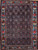 Vintage Persian Senneh area rug. Hand-knotted. All-over Herati design on dark blue field. "Gol Farang" border (French Aubusson style floral design) on abrash light blue/green background. Fine tight weave. From Senneh, Persia.