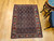 Vintage Persian Senneh area rug. Hand-knotted. All-over Herati design on dark blue field. "Gol Farang" border (French Aubusson style floral design) on abrash light blue/green background. Fine tight weave. From Senneh, Persia.