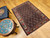 Vintage Persian Senneh area rug. Hand-knotted. All-over Herati design on dark blue field. "Gol Farang" border (French Aubusson style floral design) on abrash light blue/green background. Fine tight weave. From Senneh, Persia.