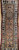 19th century Kurdish camel hair runner with geometric medallions, tribal animal motifs, and ivory border