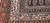 Antique Persian Malayer rug with allover paisley design on navy-blue field, early 20th century.