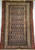 Antique Persian Malayer rug with allover paisley design on navy-blue field, early 20th century.