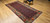 19th Century Antique Kurdish village rug. Hand-woven. All-over paisley design in blue and green.