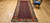 19th Century Antique Kurdish village rug. Hand-woven. All-over paisley design in blue and green.