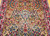 Late 19th Century Antique Persian Kerman Lavar area rug. Hand-knotted. All-over floral pattern on ivory background. Brilliant colors: blue, green, yellow, red, pink. From Kerman village, Persia.