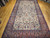 Antique Kerman Lavar Rug 11x20 | Vase Pattern | Full View on Floor