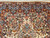 Vintage Persian Kerman Lavar rug with rare silk highlights. Ivory ground with multicolor floral motifs in pink, blue, green & yellow.