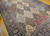 Palace-size vintage Persian Kerman rug with allover floral design in red, blue, peach, and cream on a blue field with a dark blue floral border