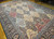 Palace-size vintage Persian Kerman rug with allover floral design in red, blue, peach, and cream on a blue field with a dark blue floral border
