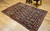 Antique Kurdish rug with paisley motifs and colorful red border with abrash from natural dyes, The Persian Knot Gallery, SKU 1048, 4’ x 6’ 4”, 4th Quarter of the 1800s