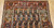 Antique Kurdish rug with paisley motifs and colorful red border with abrash from natural dyes, The Persian Knot Gallery, SKU 1048, 4’ x 6’ 4”, 4th Quarter of the 1800s