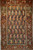 Antique Kurdish rug with paisley motifs and colorful red border with abrash from natural dyes, The Persian Knot Gallery, SKU 1048, 4’ x 6’ 4”, 4th Quarter of the 1800s