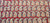 Antique Persian Tehran rug with allover paisley pattern, red field, blue border, circa early 1900s.